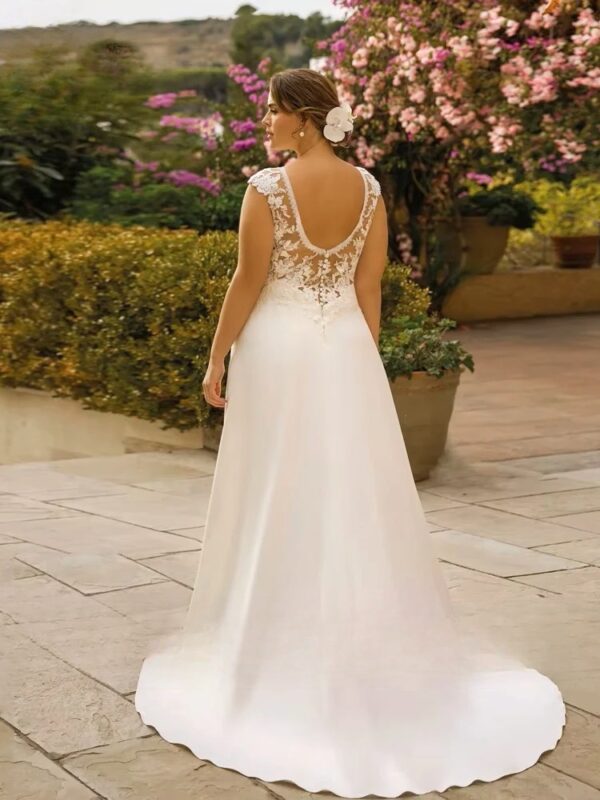 Pastrol A-Line Wedding Dresses Plus Size V Neck Cap Sleeves Bride Gowns Appliques Backless Floor Length Vestido De Noiva 2024 - immagine 2